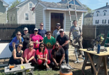 New England Construction TRAINING DAY: The New England Construction team poses for a photo before one of its team trainings in 2022. Last year, the company offered 27 programs for its employees to support their professional development.
COURTESY NEW ENGLAND CONSTRUCTION