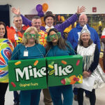 CANDY LAND: Senior staff members at Greenwood Credit Union dress up as their favorite candies at the office.  COURTESY GREENWOOD CREDIT UNION
