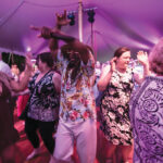 PARTY TIME: Attendees dance during Roger Williams Park Zoo’s annual Zoobilee! Feast with the Beasts fundraiser in 2019. The zoo will host its latest fundraising event on June 24.  COURTESY ROGER WILLIAMS PARK ZOO