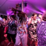 ATTENDEES DANCE DURING Roger Williams Park Zoo's annual Zoobilee! Feast with the Beasts fundraiser in 2019. The zoo will hold this year's event on June 24 at the zoo. / COURTESY ROGER WILLIAMS PARK ZOO