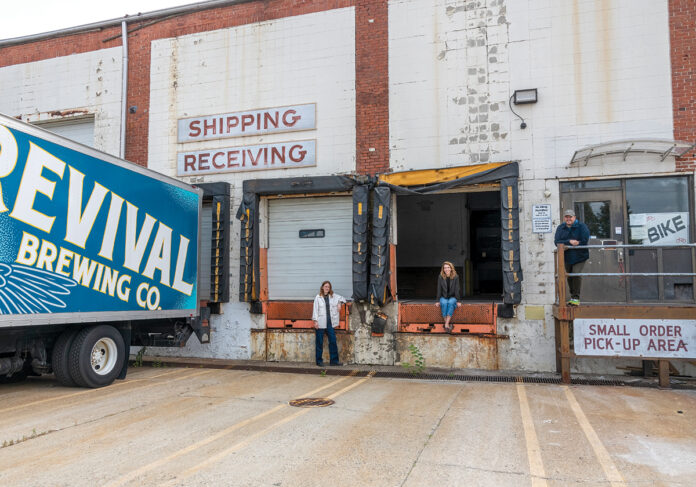 FRESH START: Philadelphia development company Scout Ltd. is revitalizing a building at 50 Sims Ave. in Providence. From left are Kelley Gerrard, creative marketing director; Lindsey Scannapieco, managing partner; and Everett Abitbol, director of development. Revival Brewing Co. was one of the first tenants of the repurposed building.
PBN PHOTO/MICHAEL SALERNO FRESH START: Philadelphia development company Scout Ltd. is revitalizing a building at 50 Sims Ave. in Providence. From left are Kelley Gerrard, creative marketing director; Lindsey Scannapieco, managing partner; and Everett Abitbol, director of development. Revival Brewing Co. was one of the first tenants of the repurposed building.
PBN PHOTO/MICHAEL SALERNO
