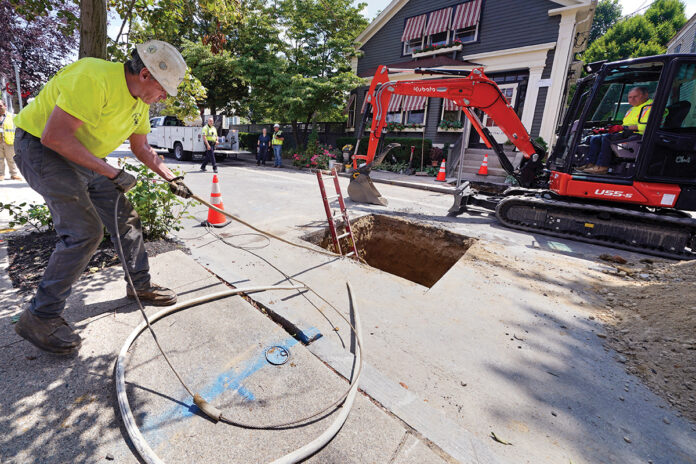LITTLE DIG: Richie Nero, left, of Boyle & Fogarty Construction Co., works on removing an old lead residential water supply line outside a home where service was getting upgraded to copper on June 29 in Providence. Health and environmental groups have been fighting for lead-free water to drink in Providence for at least a decade.
AP PHOTO/CHARLES KRUPA LITTLE DIG: Richie Nero, left, of Boyle & Fogarty Construction Co., works on removing an old lead residential water supply line outside a home where service was getting upgraded to copper on June 29 in Providence. Health and environmental groups have been fighting for lead-free water to drink in Providence for at least a decade.
AP PHOTO/CHARLES KRUPA