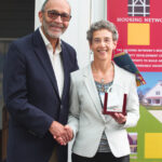 HOUSING LEADER: Anne Berman, director of real estate for the R.I. Housing and Mortgage Finance Corp., recently received the 2023 Joseph A. Caffey Award from the Housing Network of Rhode Island. At left is former R.I. Superior Court Associate Justice Edward C. Clifton.  COURTESY HOUSING NETWORK OF RHODE ISLAND 