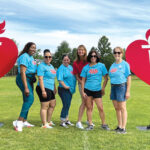 FULL OF HEART: Multiple AAA Northeast employees participate in a recent Southern New England Heart Walk in support of the American Heart Association.  COURTESY AAA NORTHEAST