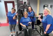 R.I. Medical Imaging’s office comfort includes working out and four-legged friends TRAINING DAY: Rhode Island Medical Imaging Inc. employees, from left, Alla Kapustin, Carlene Hervieux, Lisa Handy and Sara Anne Poirier, recently participated in an eight-week personal training program at the company’s on-site fitness center.
COURTESY RHODE ISLAND MEDICAL IMAGING INC.