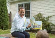 Gaynor teaches calming techniques to ensure students are ready to learn ONE-ON-ONE: Jenny Gaynor, owner of Calm Education, reads to her daughter, Ella. Gaynor coaches kids in social and emotional learning.
PBN PHOTO/RUPERT WHITELEY