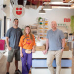 SPECIALTY SHOP: Tyler and Anna Burnley, left, and Chad Hoffer, right, opened Utility in Middletown, a store that sells unique kitchen tools, cookware and pantry items.  PBN PHOTO/DAVID HANSEN
