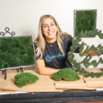 DANDY MOSS: Jamie Mitri, founder and CEO of Moss Pure, showcases her moss products that will help improve air quality. A patent on her products is still pending.  PBN PHOTO/DAVID HANSEN