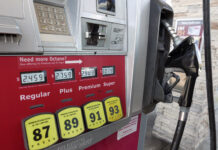 THE AVERAGE weekly price of self-serve, regular unleaded gasoline in Rhode Island is $3.70 per gallon, 5 cents lower than last week and 9 cents below the national average, AAA Northeast says. / AP FILE PHOTO/JOHN RAOUX