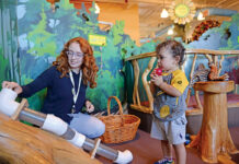 Finding workforce is labor intensive for local nonprofits PLAYTIME: Jordan Towle, a visitor services manager at the Providence Children’s Museum, plays with Jorge Rodrigues, 1, of Providence. The museum, according to Executive Director Caroline Payson, relies on ticket sales and membership fees to bolster operating costs.
PBN PHOTO/ELIZABETH GRAHAM