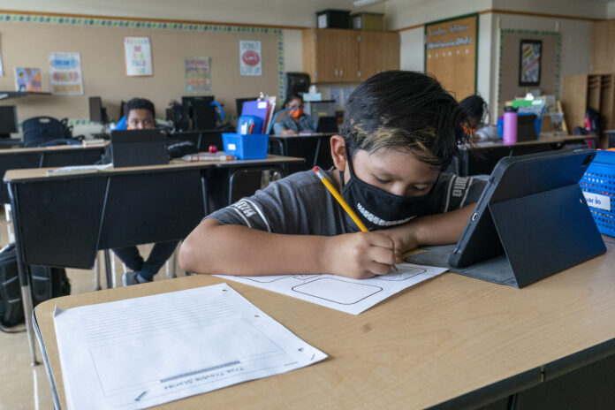 STUDENTS IN RHODE ISLAND have shown overall improved proficiency in both math and English language arts on the Rhode Island Common Assessment System exam in 2023. However, R.I. Education Commissioner Angélica Infante-Green said the state still has a lot of work to do to improve educational outcomes across the state. / AP FILE PHOTO/MARY ALTAFFER STUDENTS IN RHODE ISLAND have shown overall improved proficiency in both math and English language arts on the Rhode Island Common Assessment System exam in 2023. However, R.I. Education Commissioner Angélica Infante-Green said the state still has a lot of work to do to improve educational outcomes across the state. / AP FILE PHOTO/MARY ALTAFFER