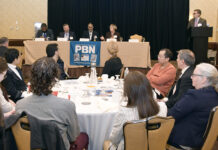 Ready for the hackers? Many companies are woefully unprepared BE PREPARED: Linn F. Freedman, second from right, explains the importance of assembling a strong cybersecurity plan during a panel discussion at PBN’s Cybersecurity & Tech Summit on Oct. 12. With her on the panel are, from left, Douglas Tondreau, associate professor of computer science at Johnson & Wales University; Rick Norberg, founder and CEO of Vertikal6 Inc.; and Robby Gulri, engineering solutions expert at RapidScale Inc. Moderating is Normand Duquette, standing at right, Starkweather & Shepley Insurance Brokerage Inc. senior vice president.
PBN PHOTO/MIKE SKORSKI