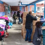 WINTER COATS ARE collected in 2020 as part of Ocean State Job Lot's Buy, Give Get holiday initiative. This year's collection will run through Jan. 3, 2024. / COURTESY OCEAN STATE JOB LOT