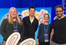 SARA SWEETMAN, left, associate professor of education at the University of Rhode Island, stands with, from left, Jorge Cham, co-creator of "Elinor Wonders Why;" Anne Lund, senior director of content and curriculum at PBS Kids; and Daniel Whiteson, show co-creator. / COURTESY UNIVERSITY OF RHODE ISLAND