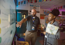 Davies Career and Technical High School making an impact in the classroom CLASS PREPARATION: William M. Davies Jr. Career and Technical High School English teacher Dina Louis, right, and social studies teacher Ryan Hall go over a lesson plan in a classroom at the Lincoln-based school.
PBN PHOTO/RUPERT WHITELEY