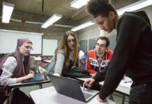 CCRI offers pathways in the classroom and beyond OFFERING GUIDANCE: Community College of Rhode Island professor Alyson Snowe, second from left, talks with her technical writing students, from left, Iskandar Miley, Kenneth Hanner and Bryan Pichardo.
PBN PHOTO/RUPERT WHITELEY