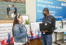 Amgen Rhode Island is making a better community together GROWING TALENT: Part of Amgen Rhode Island’s talent council’s mission is to discuss the continued development and professional growth of the company’s diverse talent, especially where it may have hidden gems within the organization. Pictured are Jessica Chou, left, Amgen’s senior associate of quality control; and Elijah Otele, quality assurance specialist.
PBN PHOTO/TRACY JENKINS