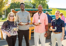 Amica employees feel right at home REWARDING MEAL:
Amica Mutual Insurance Co. employees, from left, Cindy Piatti, Isaiah Tamdji, Liddon Norman and Gil Petro eat during a National Customer Service Week company lunch event.
COURTESY AMICA MUTUAL INSURANCE CO.