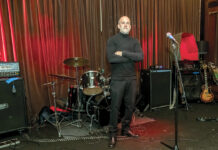 ‘Creating a space for artists and musicians’ a labor of love for Providence teacher DOUBLE LIFE: Rick Sunderland, a gym and health teacher at Classical High School, opened live music venue Dusk on Harris Avenue in Providence in 2010 because of a passion for live music and a desire to showcase musicians and artists.
PBN PHOTO/MICHAEL SALERNO