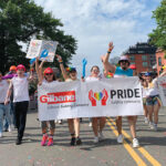A SHOW OF PRIDE: Gilbane Inc. employees participate in a recent Pride parade supporting the LGBTQ+ community. COURTESY GILBANE INC.