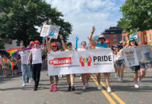 Gilbane demonstrates and builds a culture of caring A SHOW OF PRIDE: Gilbane Inc. employees participate in a recent Pride parade supporting the LGBTQ+ community.
COURTESY GILBANE INC.
