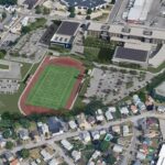 A RENDERING SHOWS a new unified high school built on the site of McCoy Stadium in Pawtucket. The city's new high school project, among other various school projects around the state, was approved Tuesday by the R.I. Council on Elementary and Secondary Education. / COURTESY S/L/A/M COLLABORATIVE