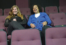 Inclusion is no act at Trinity Rep LIVE AUDIENCE: Montana Palmer, left, human resources manager at Trinity Repertory Company, talks with Monique Austin, director of equity, diversity, inclusion and accessibility at Trinity Rep, in the theater in downtown Providence.
PBN PHOTO/ELIZABETH GRAHAM