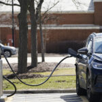 TWO ELECTRIC vehicle charging stations are being installed along Interstate 95 in Rhode Island as part of Phase 1 of the National Electric Vehicle Infrastructure Program. / AP FILE PHOTO/NAM Y. HUH