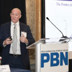 GROWTH ­BARRIER: Thomas Tzitzouris, head of fixed income research at Strategas Research Partners, tells attendees of Providence Business News’ recent Economic Trends Summit that limited small-business creation is a weak spot in the state’s economy.  PBN FILE PHOTO/MIKE SKORSKI