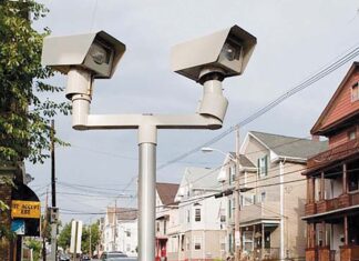 MORE MONITORS? The city of Providence already has traffic cameras such as these at Chalkstone Avenue and Raymond Street keeping an eye out for motorists running red lights. Other cameras capture images of speeders. Now the Smiley administration wants the ability to enforce traffic noise automatically.  PBN FILE PHOTO