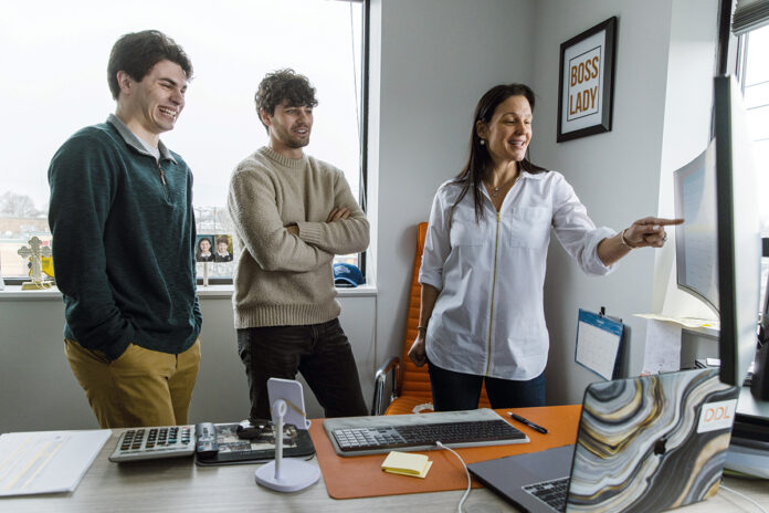 AD CONFAB: DDL Advertising LLC owner Stacey Caputi Liakos, right, chats with digital media manager Zach Ferri, center, and Daniel Antunes, a digital marketing associate. Ferri says the use of cookies to track internet users has been evolving, and that change will continue as Google LLC phases out third-party cookies on its browser Chrome.
PBN PHOTO/RUPERT WHITELEY AD CONFAB: DDL Advertising LLC owner Stacey Caputi Liakos, right, chats with digital media manager Zach Ferri, center, and Daniel Antunes, a digital marketing associate. Ferri says the use of cookies to track internet users has been evolving, and that change will continue as Google LLC phases out third-party cookies on its browser Chrome.
PBN PHOTO/RUPERT WHITELEY