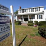 THE MEDIAN price of single-family homes sold in Rhode Island continued to climb in January, rising 12.9% from a year earlier, while sales fell for the 21st consecutive month, the Rhode Island Association of Realtors says. / AP FILE PHOTO/STEVEN SENNE