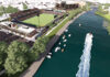 VENUE VIEW: A rendering of what the Tide­water Stadium in Pawtucket is supposed to look like when completed in 2025. At the top of the image is a mixed-use building that has been proposed for Phase 1B, as well as a pedestrian bridge across the Seekonk River to structures that would be part of Phase 2. COURTESY FORTUITOUS PARTNERS LLC
