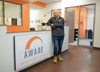 PURPOSE DRIVEN: Garrick Wann, a manager of client recovery advisers at Aware Recovery Care of Rhode Island LLC, has had his own battles with addiction but uses that experience to help others, giving him a sense of purpose.  PBN PHOTO/­ELIZABETH GRAHAM