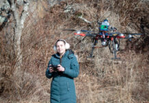 TEST FLIGHT: Erin Linebarger flies a prototype robotic drone in Newport. The drone was developed by Robotics 88 Inc., the company she co-founded with Tyler Lane to assist with prescribed fire planning, which involves controlled burns to remove dead and harmful vegetation to prevent the spread of wildfires and allow for new growth. PBN PHOTO/DAVID HANSEN