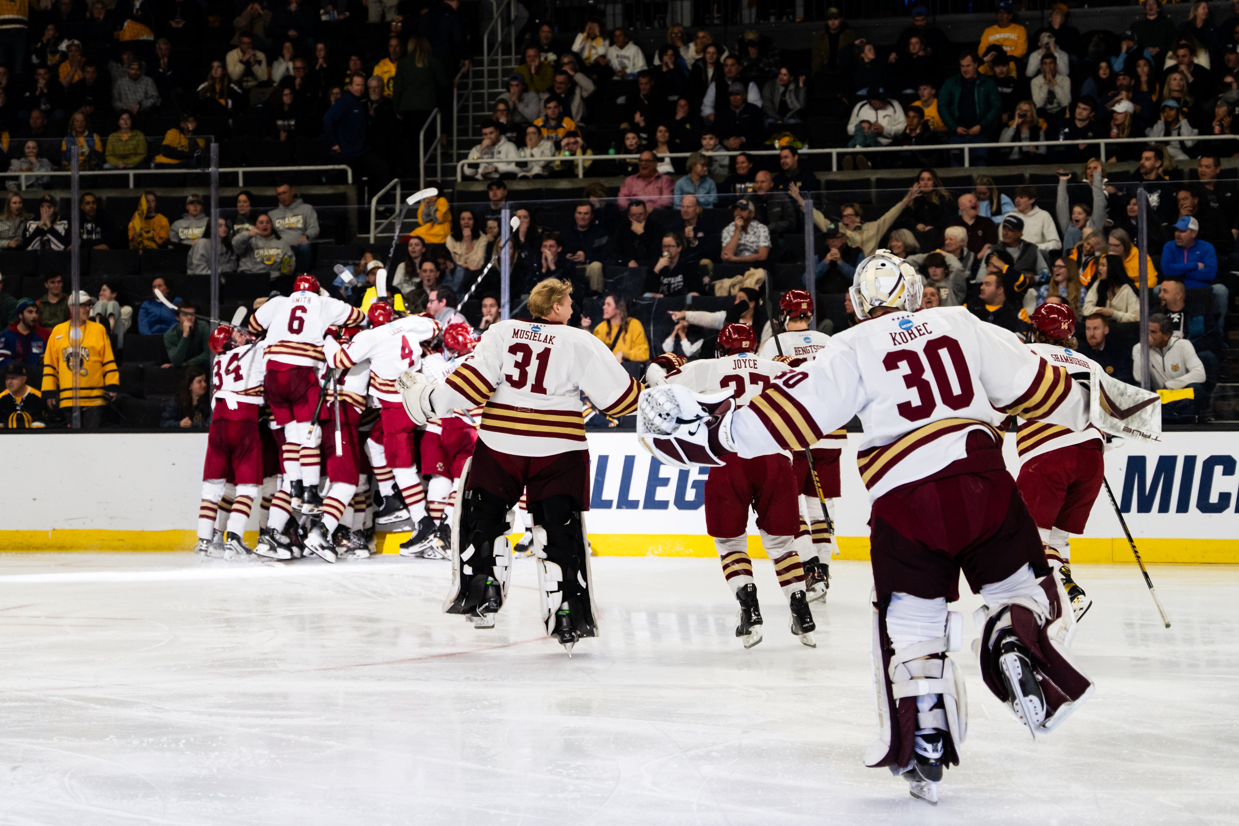 The Boston University men's hockey team celebrated an overtime victory over Quinnipiac University in the NCAA Division I men's hockey tournament on March 31 at Amica Mutual Pavilion in Providence. Hockey Region brought his $1.9 million economic impact to the region. / Provided by: Boston University Men's Hockey Club