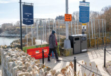 WALKERS HEADING south on the Newport Cliff Walk are stopped at Narragansett Avenue by fencing because part of the historic walk collapsed about two years ago. Visitors are required to detour through a nearby neighborhood to reconnect with the path farther south.  PBN FILE PHOTO/DAVID HANSEN