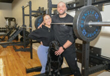 FITNESS FAMILY: Husband and wife trainers Spencer and Maddy Desiata, who opened their Desiata Training fitness studio in Warren in March 2023, are pictured with their dog, Abe. PBN PHOTO/DAVID HANSEN