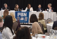 HEALTHY DISCUSSION: PACE Organization of Rhode Island CEO Joan Kwiatkowski, right, speaks during a panel discussion at Providence Business News’ Health Care Summit and Health Care Heroes Awards event at the Providence Marriott on April 4. Also on the panel are, from left, Dr. Michael Wagner, Care New England Health System CEO and president; Dr. Kristin Russell, Neighborhood Health Plan of Rhode Island chief medical officer; Sen. Pamela J. Lauria, D-Barrington; and Dr. Raj Hazarika, Point32Health Services Inc. chief medical officer and vice president of commercial ­products.  PBN PHOTO/MIKE SKORSKI