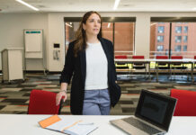 CLIMBING THE LADDER: Kathryn Strumolo rose through the ranks at ­Gilbane Building Co., part of Gilbane Inc., from being an intern to ­currently the company’s New England support operations manager.  PBN PHOTO/RUPERT WHITELEY