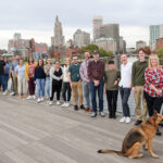 WALK ON: As part of its Well-Being Week, Chisholm Chisholm & Kilpatrick Ltd. employees hold a group walk across the Providence Pedestrian Bridge.  COURTESY CHISHOLM CHISHOLM & KILPATRICK LTD