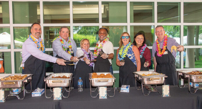 LUNCHTIME: Members of Amica Mutual Insurance Co.’s senior leadership team serve lunch to employees at one of the company’s summer cookouts.
COURTESY AMICA MUTUAL INSURANCE CO. LUNCHTIME: Members of Amica Mutual Insurance Co.’s senior leadership team serve lunch to employees at one of the company’s summer cookouts.
COURTESY AMICA MUTUAL INSURANCE CO.