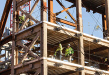 BUILDING BLOCKS:  Construction staff members for  Shawmut Design and Construction  work on a recent building project in Providence.  COURTESY SHAWMUT DESIGN AND CONSTRUCTION