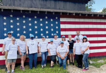 Starkweather & Shepley Insurance Brokerage Inc. GIVING BACK: As part of its mentorship program, Starkweather & Shepley Insurance Brokerage Inc. employees spend time at the Dare to Dream Ranch in Foster to help with daily tasks, lay mulch and give back to the community.
COURTESY STARKWEATHER & SHEPLEY INSURANCE BROKERAGE INC.