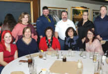 The Providence Mutual Fire Insurance Co. DINNER TIME: Staffers at The Providence Mutual Fire Insurance Co. enjoy a dinner outing together.
COURTESY THE PROVIDENCE MUTUAL FIRE INSURANCE CO.