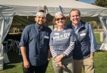 University of Rhode Island Foundation & Alumni Engagement TIME TO GIVE: From left, University of Rhode Island Foundation & Alumni Engagement employees Karan Salunkhe, Patricia Gross and Leo Perrone participate in the university’s Day of Giving back in September.
COURTESY UNIVERSITY OF RHODE ISLAND FOUNDATION & ALUMNI ENGAGEMENT