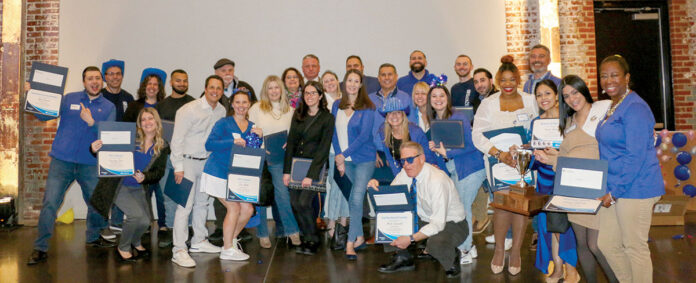 GOING ALL IN: BankNewport employees at the company’s annual All Employee Rally celebrate being “All In” for customers and communities.
COURTESY BANKNEWPORT GOING ALL IN: BankNewport employees at the company’s annual All Employee Rally celebrate being “All In” for customers and communities.
COURTESY BANKNEWPORT