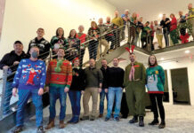Building Enclosure Science LLC FEELING FESTIVE: Building Enclosure Science LLC employees dress in holiday attire during a recent company gathering.
COURTESY BUILDING ENCLOSURE SCIENCE LLC