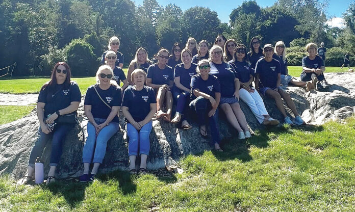 HANGING OUT: Employees for the Rhode Island Primary Care Physicians Corp. relax at its annual cookout event.  COURTESY RHODE ISLAND PRIMARY CARE PHYSICIANS CORP.
