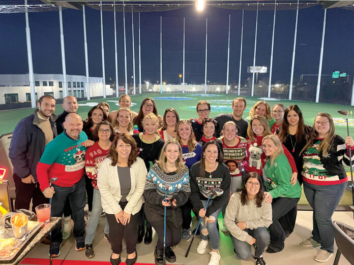 HOLE IN ONE: South County Smiles employees gather for a holiday party at Topgolf Rhode Island in Cranston.
COURTESY SOUTH COUNTY SMILES HOLE IN ONE: South County Smiles employees gather for a holiday party at Topgolf Rhode Island in Cranston.
COURTESY SOUTH COUNTY SMILES